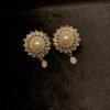 zircon set with white pearl